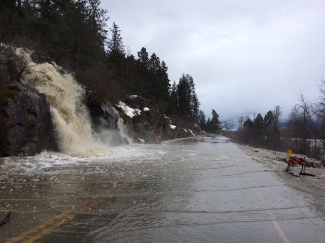 waterfall spilling on to highway