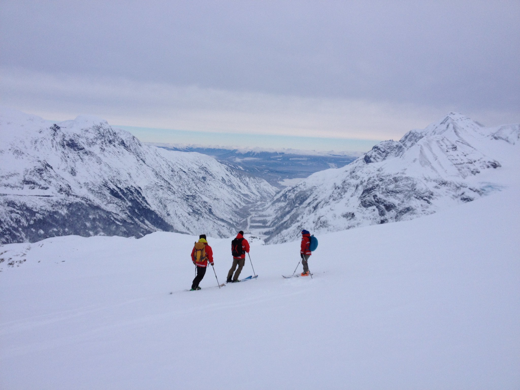 Ministry avalanche technicians scope out the terrain above Bear Pass during an avalanche control mission north of Stewart, BC.