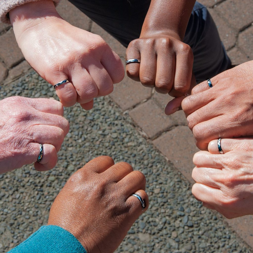 Engineers showing off their Engineering Rings