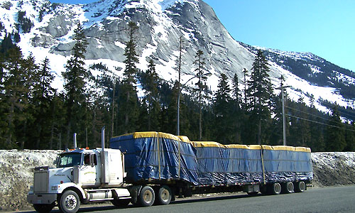 A large cargo shipment under wraps while in transport by a commercial vehicle in BC