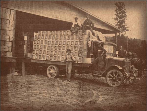 old photo of truck with fruit