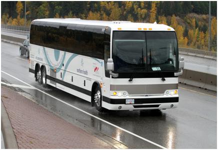 Neil Taylor at the wheel of a Northern Health Connections coach.