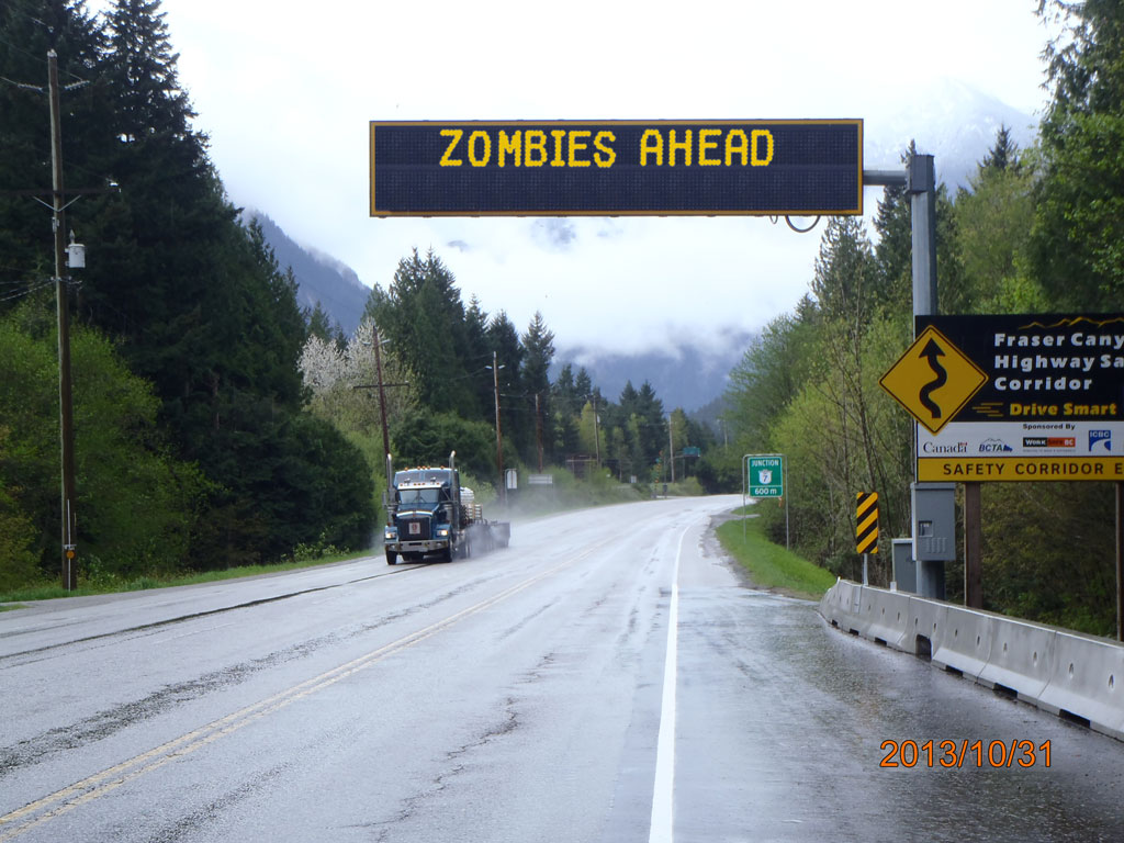 zombies ahead on overhead sign