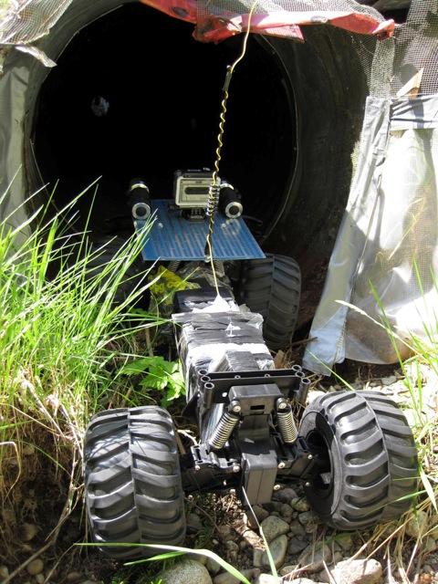 crawler entering culvert