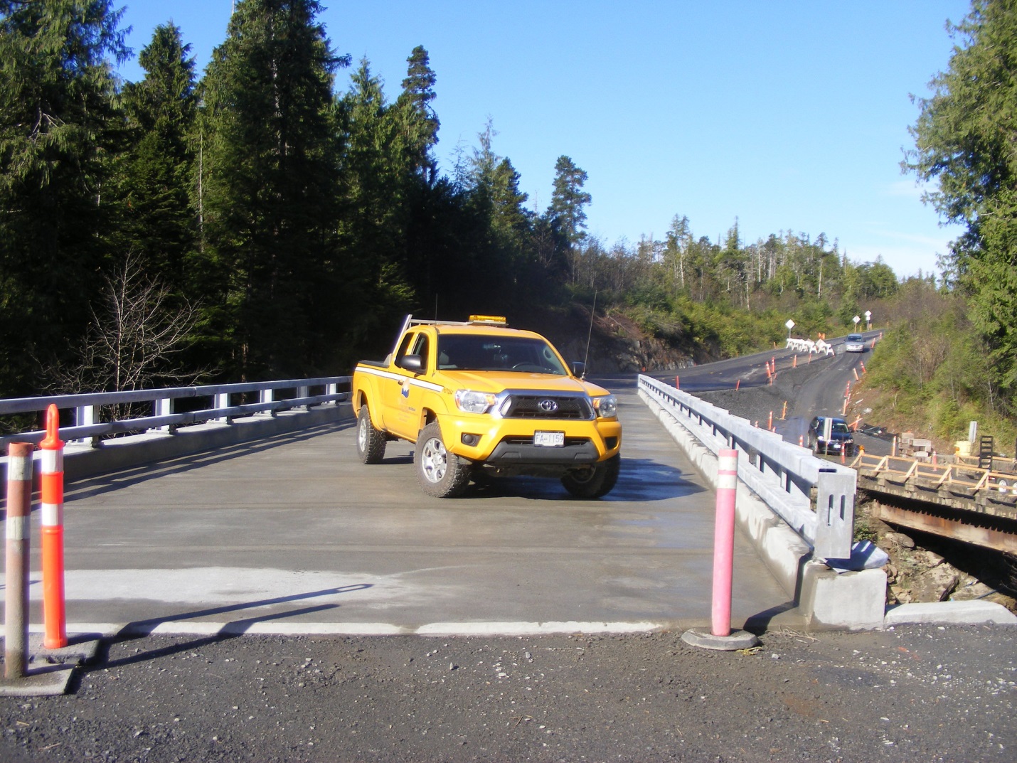 Ministry truck parked half way across a bridge