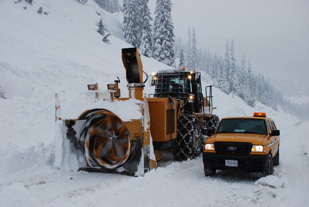 Loaders can also be equipped with snow blowers to chew through BIG deposits of snow, like this, following avalanche control work.