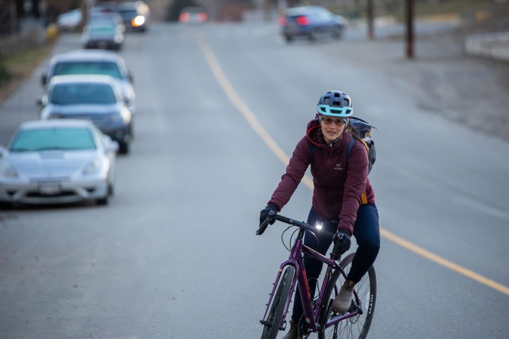 Woman riding bike on a cold day in Kamloops