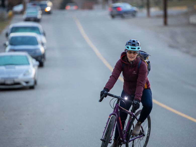 Woman riding bike on a cold day in Kamloops