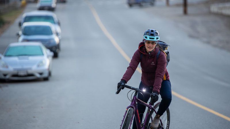 Woman riding bike on a cold day in Kamloops