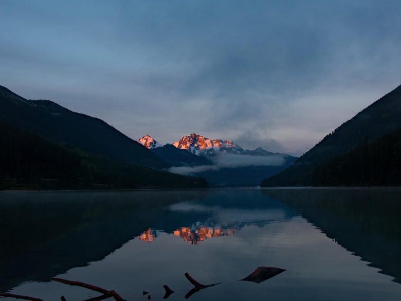 Sun hitting mountains at Duffey Lake