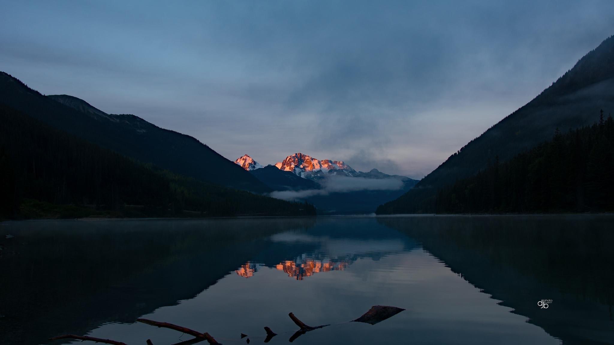 Sun hitting mountains at Duffey Lake